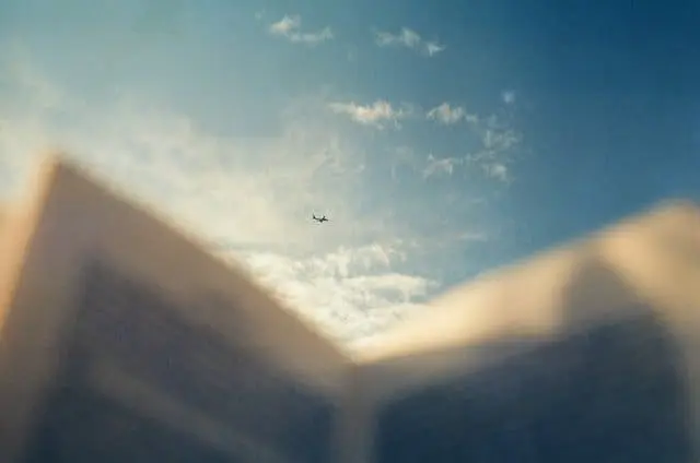 Book and aircraft.